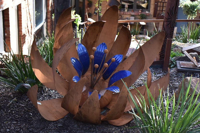 Blue and rust ground flower, Tread Sculptures, Melbourne
