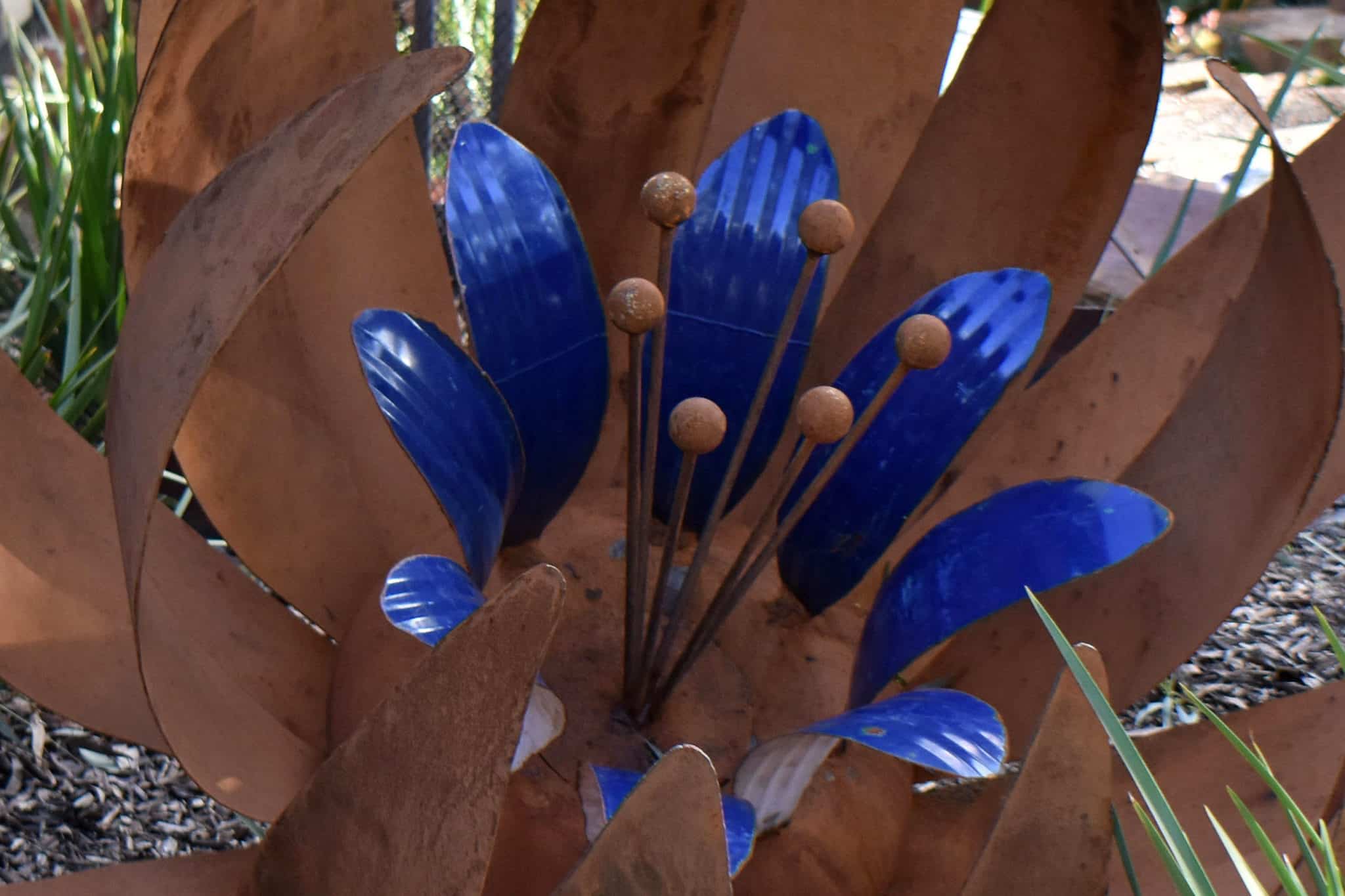 Blue and rust ground flower, Tread Sculptures, Melbourne