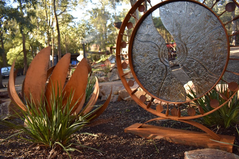 Metal and glass outdoor sculpture, handmade in Melbourne. Perfect for garden and landscaping decoration.