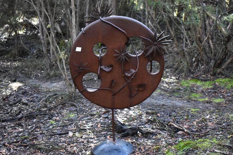 Overtaken, reclaimed metal garden art, Tread Sculptures