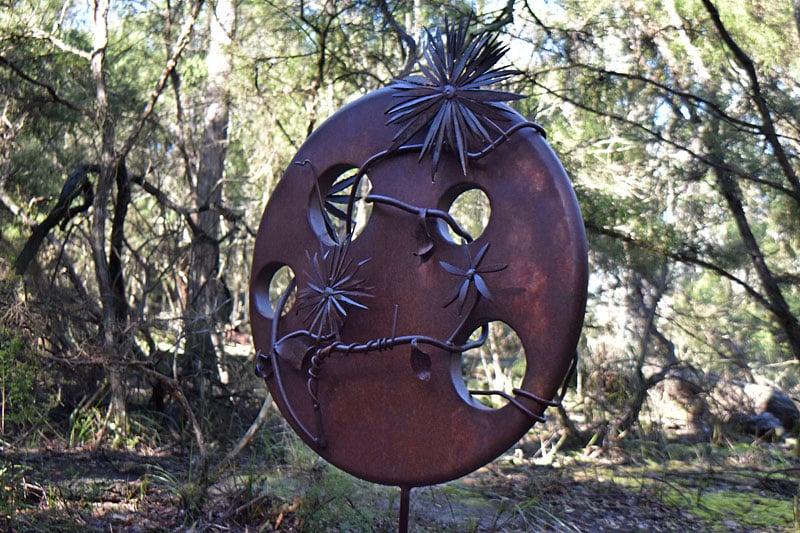 Overtaken, reclaimed metal garden art, Tread Sculptures