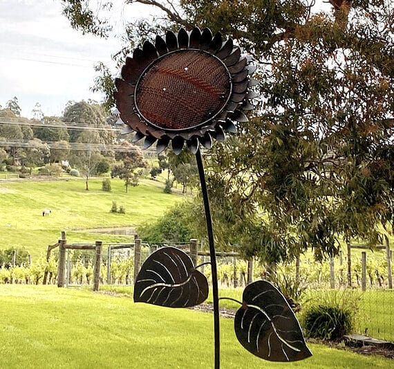 Large-sized upcycled sunflower garden art handmade by Tread Sculptures in Melbourne, Australia