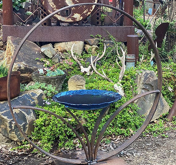 Upcycled birdbath made from reclaimed wagon wheels rims by Tread Sculptures in Melbourne, Australia