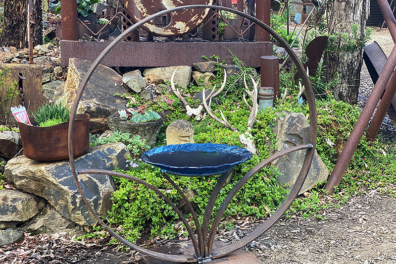 Upcycled birdbath made from reclaimed wagon wheels rims by Tread Sculptures in Melbourne, Australia