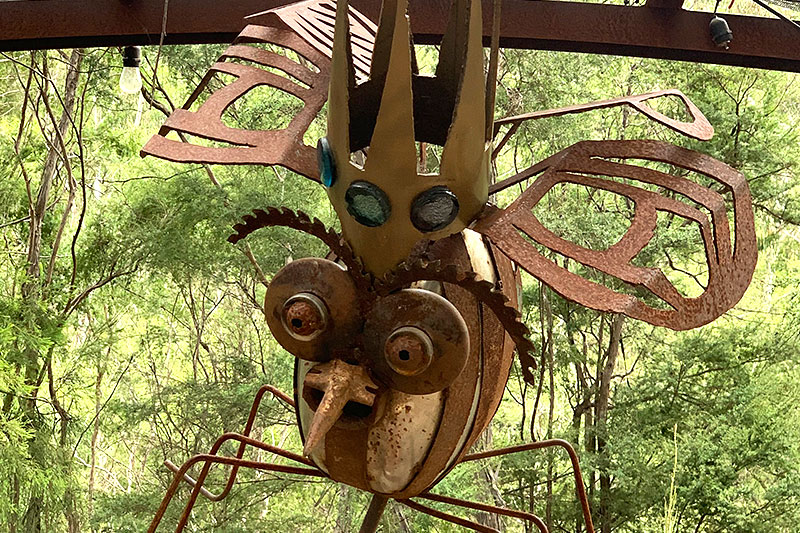 Quirky bee sculpture made from reclaimed steel and recycled glass by Tread Sculptures in Melbourne, Australia