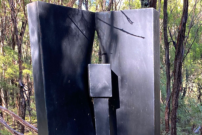 Clean metal sculpture made from steel and enamel by Ernst Fries in Victoria, Australia