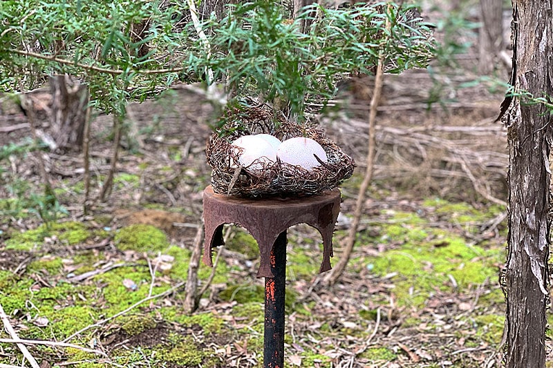Handmade stainless nest with ceramic eggs by Tread Sculptures in Melbourne, Australia