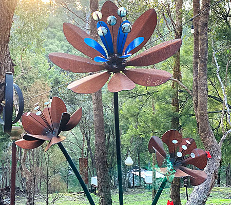 Scrap metal sculpture flower made from recycled materials by Tread Sculptures in Melbourne, Australia