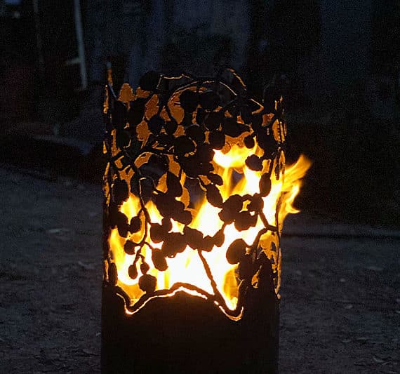 Firepit made from 100% reclaimed materials and plasma cut handmade by Linda MacAuley.