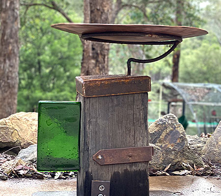 Ripples birdbath made from Old Ironbark timber reclaimed metal by Tread Sculptures in Melbourne, Australia