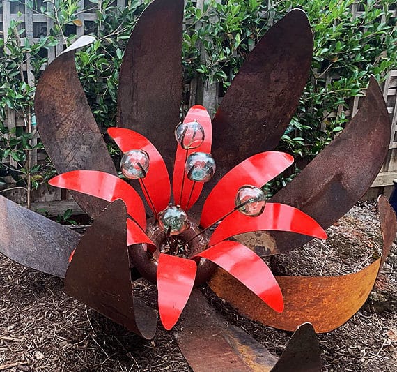Scrap metal flower sculpture made from reclaimed materials by Tread Sculptures in Melbourne, Australia