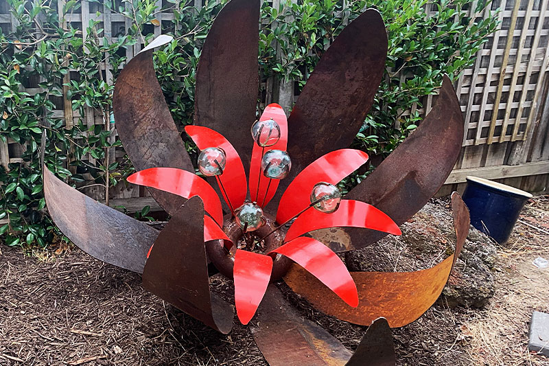 Scrap metal flower sculpture made from reclaimed materials by Tread Sculptures in Melbourne, Australia