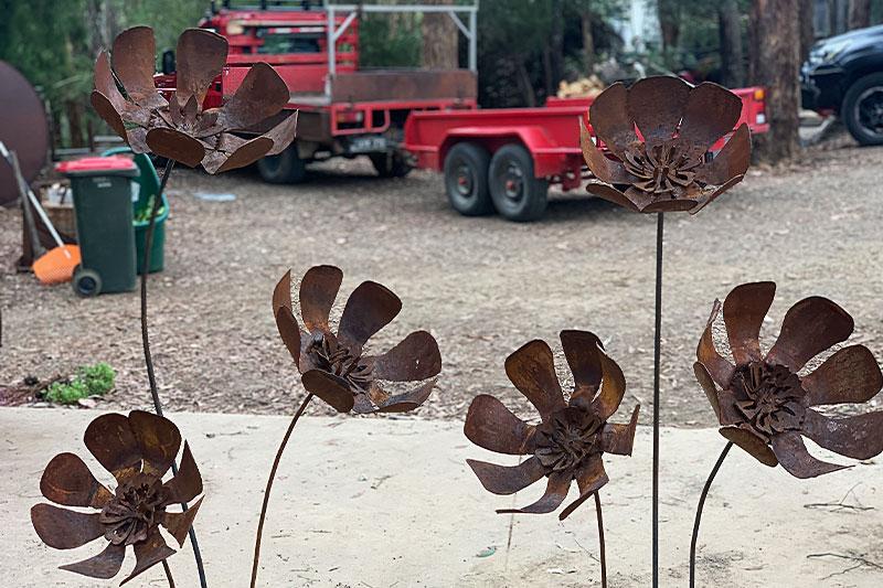 Rusty scrap metal flower garden art made from recycled materials by Tread Sculptures in Melbourne