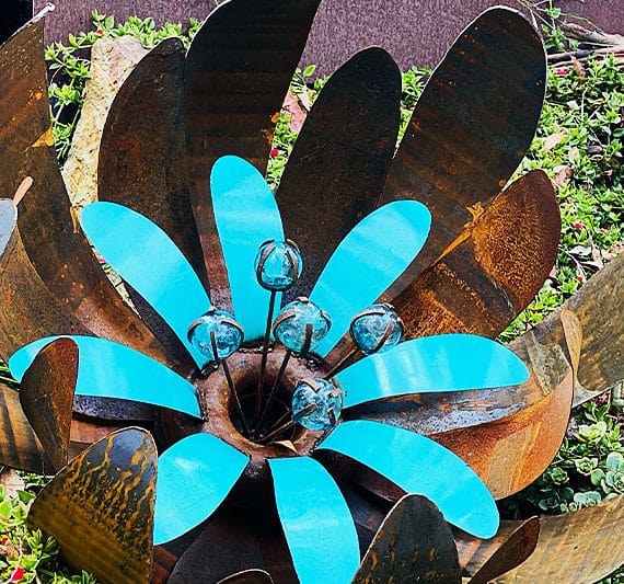 Reclaimed metal ground flower sculpture made in Melbourne, Australia