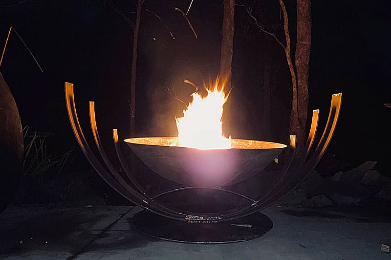 Reclaimed metal firepit made from recycled materials by Tread Sculptures