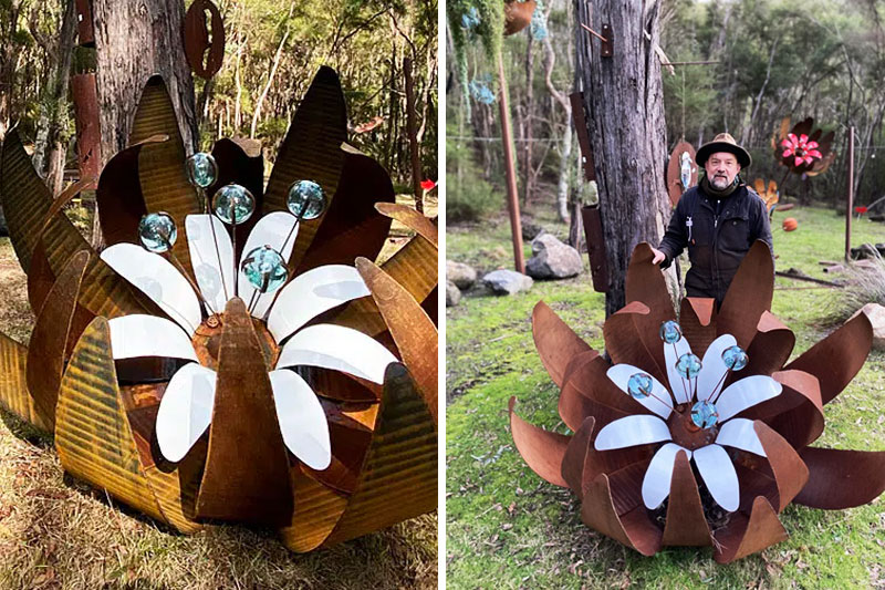Scrap metal flower with triple layers and Japanese glass fishing float stamens handmade by Tread Sculptures in Melbourne, Australia