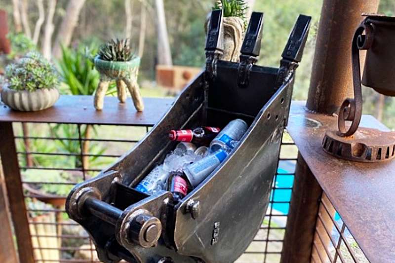 Scrap metal ice bucket made from recycled materials