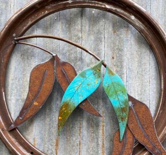 Handmade reclaimed metal hanging leaves sculpture