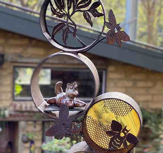 Recycled glass metal honey sculpture by Tread Sculptures