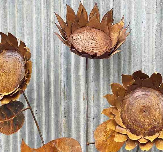 Scrap metal sunflower sculptures made by Tread Sculptures