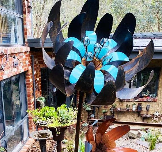 Handmade metal flower garden sculpture made in Melbourne, Australia by Tread Sculptures