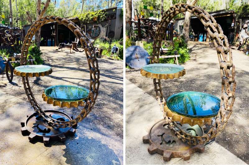 Scrap metal birdbath made from reclaimed excavator truck chain
