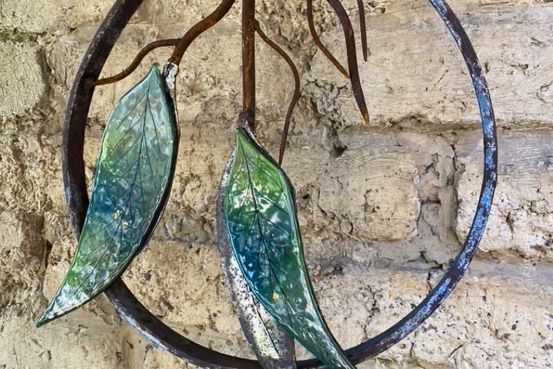 Single Sided with two large glass leaves Winter Gums is sculpted from reclaimed material with steel leaves plasma cut by hand to form the base for the glass.