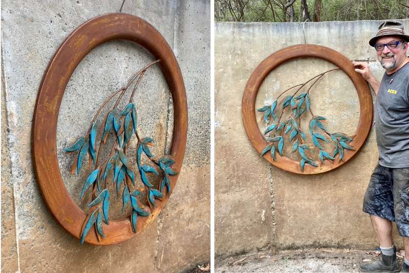 Scrap metal wall piece handmade by Tread Sculptures