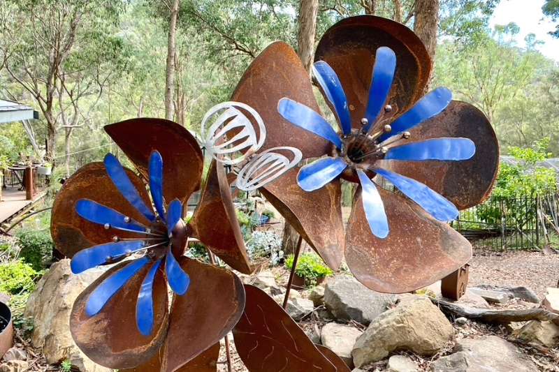 Rusty Blue Poppies metal garden piece handmade by Tread Sculptures