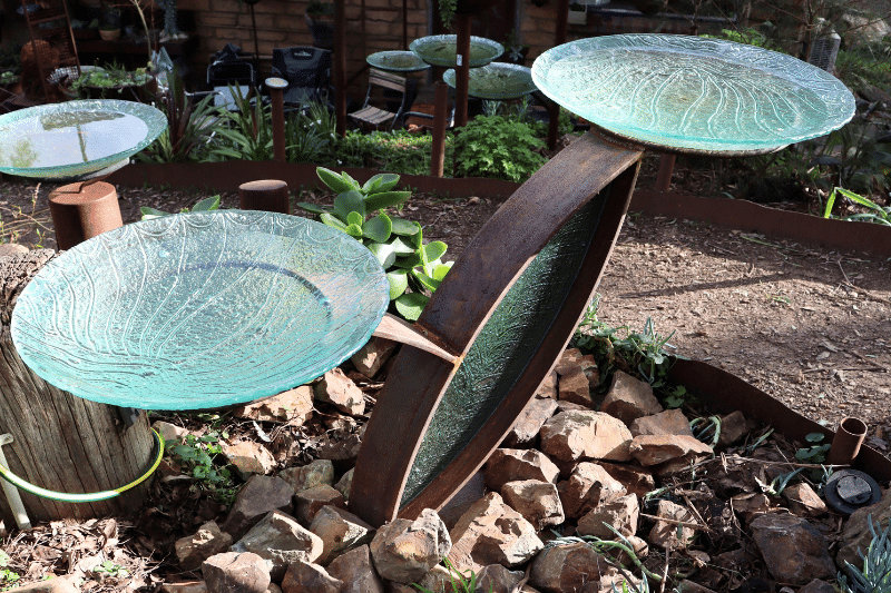 Scrap metal birdbath by Tread Sculptures