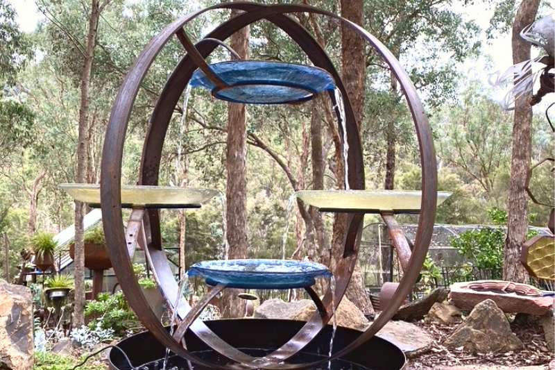 Upcycled metal birdbath made from recycled materials by Tread Sculptures