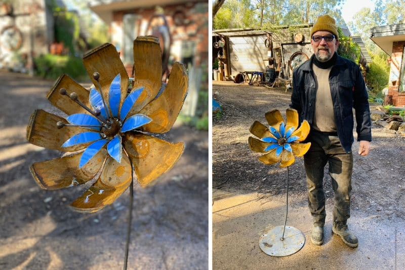 Rusty flower sculpture made from recycled materials