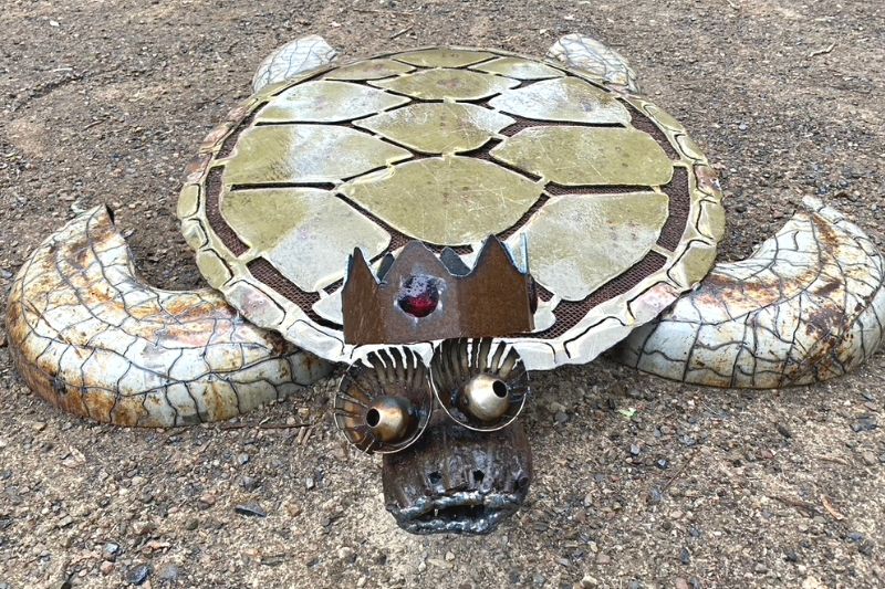 Whimsical sea turtle sculpture made from reclaimed materials