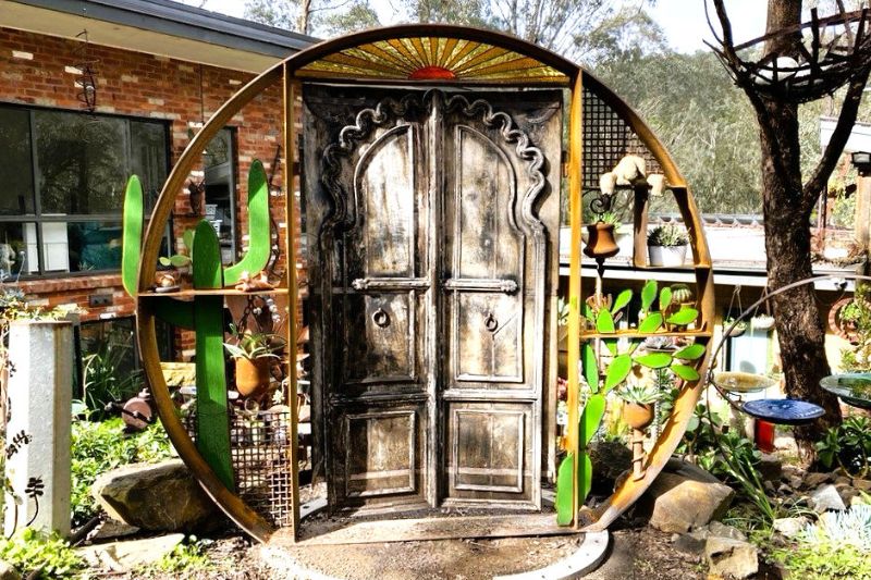 Handmade metal gate made with with these teak doors approximately 130 year old from India