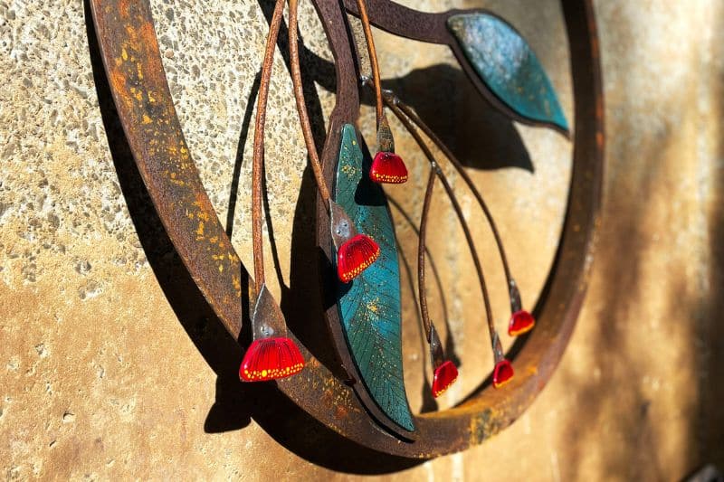 Glass leaves and flowers made from reclaimed metal