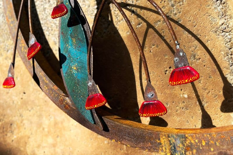 Glass leaves and flowers made from reclaimed metal