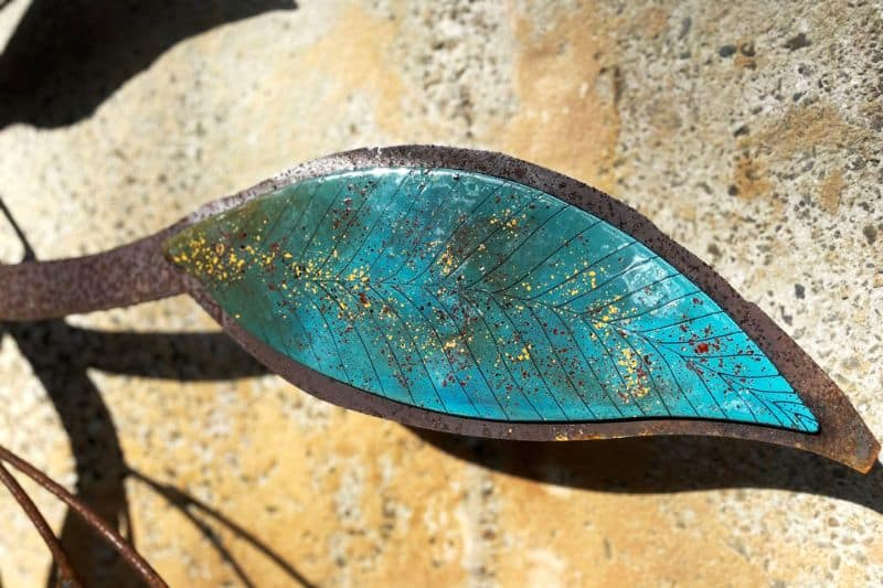 Glass leaves and flowers made from reclaimed metal