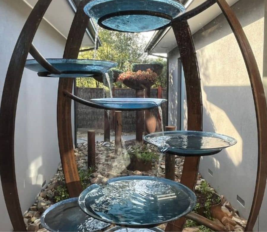 Completed custom water feature and sky gardens providing a tranquil courtyard setting.